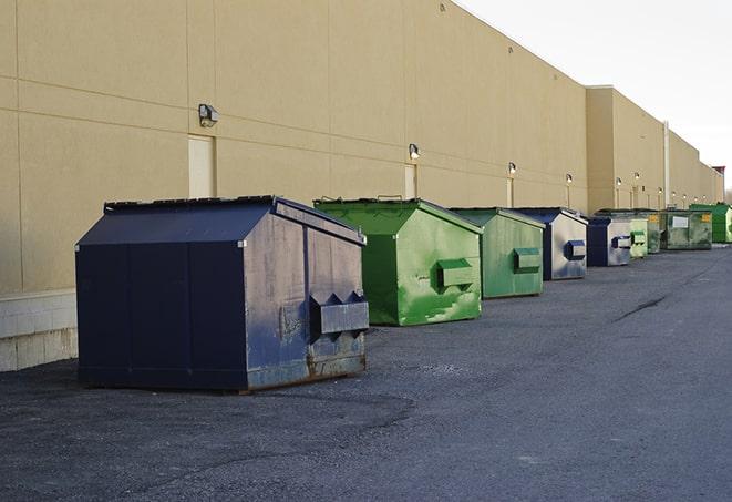 large trash container at construction site in Lynn